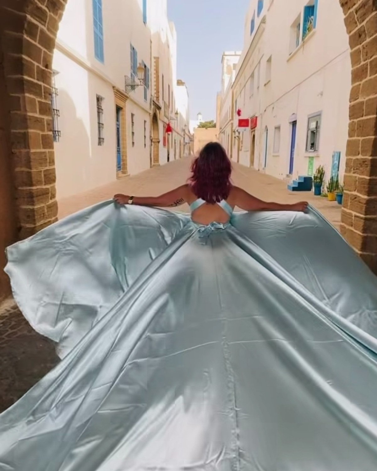 Chefchaouen light blue flying dress in the historic Medina of Essaouira