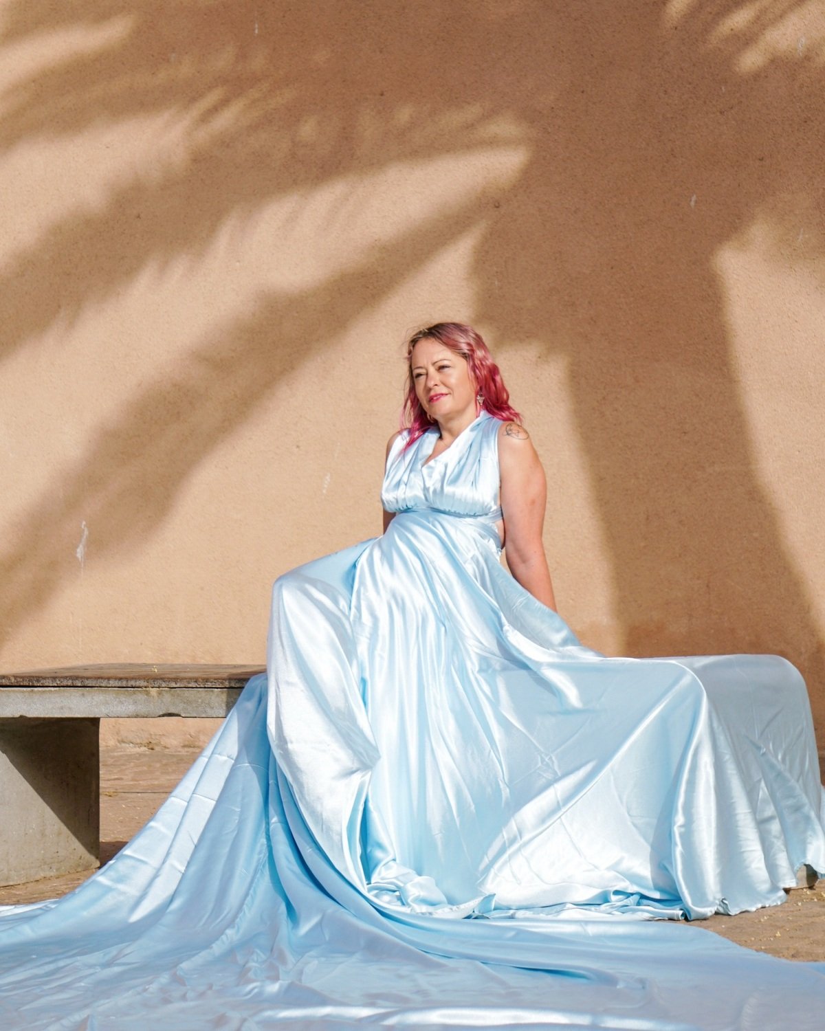 Chefchaouen flying dress in palm shadows in Essaouira