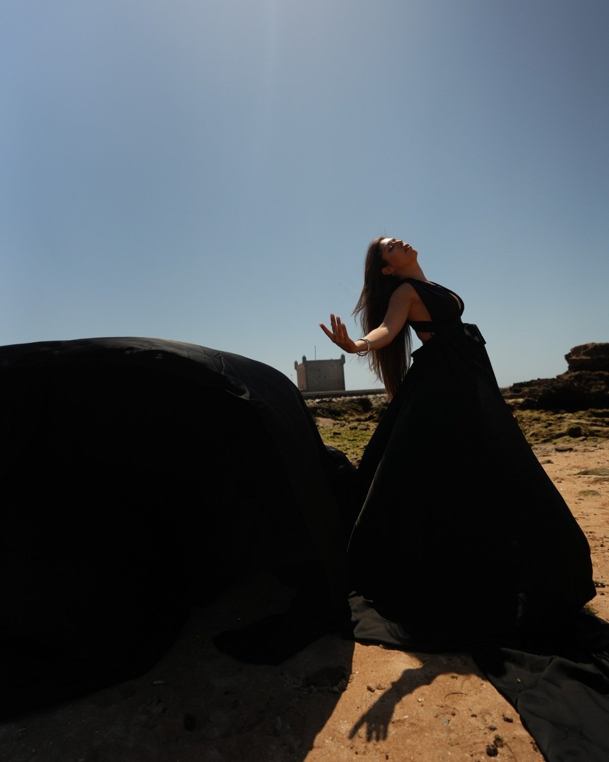 New York black flying dress at the historic Skala in Essaouira